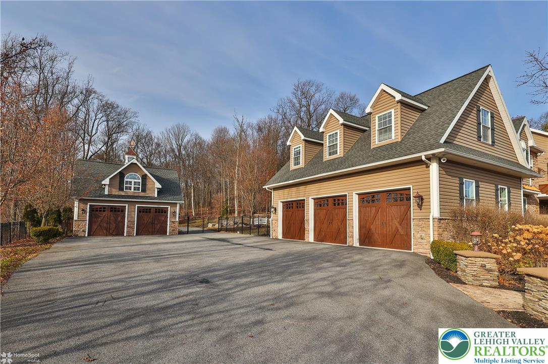 284 Walker Road Macungie, PA 18062 - Photo 7 of 99 a front view of a house with a garden