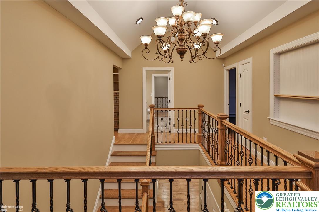 284 Walker Road Macungie, PA 18062 - Photo 73 of 99 a view of a porch with wooden floor and chandelier