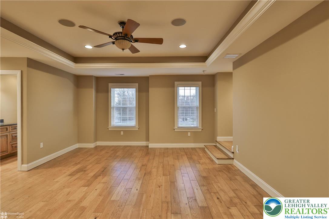 284 Walker Road Macungie, PA 18062 - Photo 74 of 99 a view of an empty room with a window and wooden floor