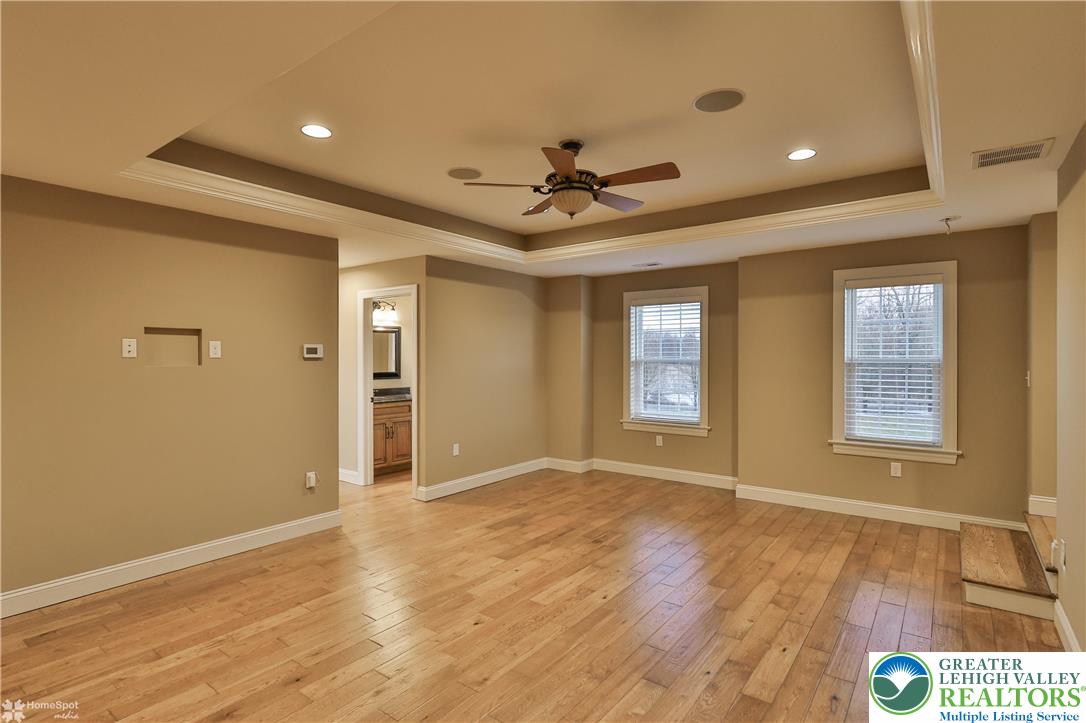 284 Walker Road Macungie, PA 18062 - Photo 75 of 99 a view of an empty room with a window and wooden floor