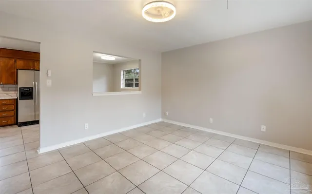 a view of an empty room with window