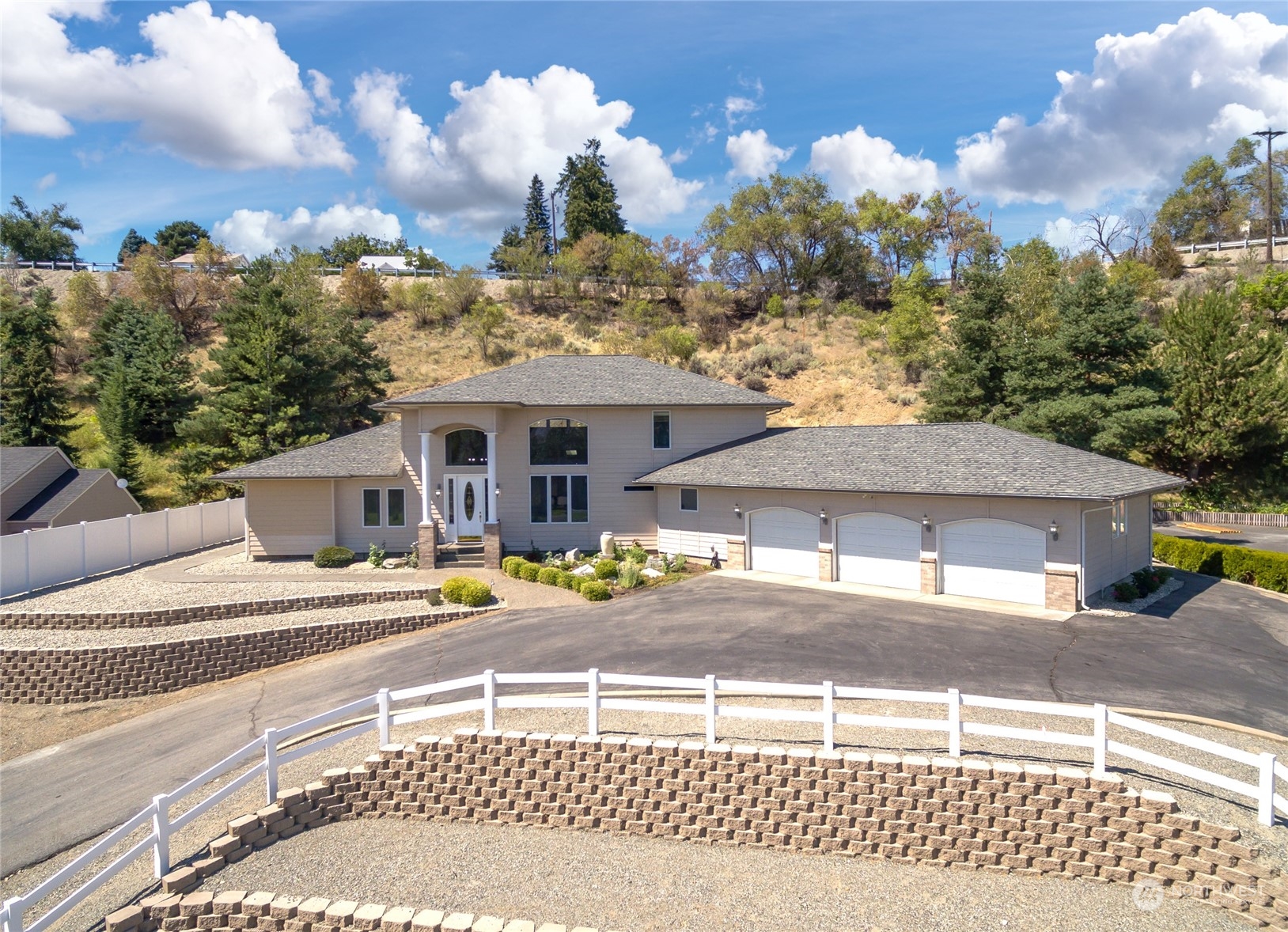 8 Valley View Park Road Omak, WA 98841 - Photo 1 of 40 a house with trees in the background