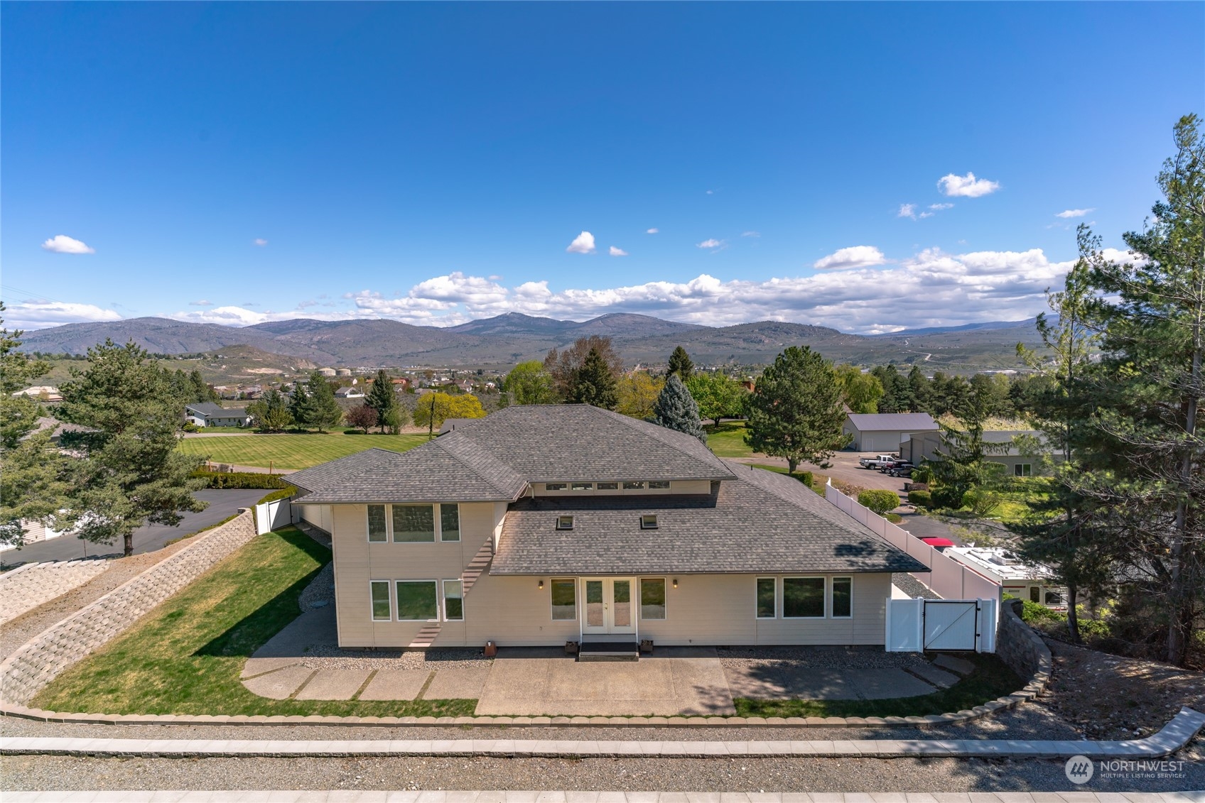 8 Valley View Park Road Omak, WA 98841 - Photo 11 of 40 a view of a big house with a big yard