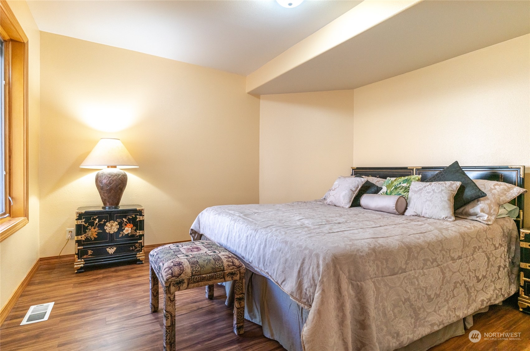 8 Valley View Park Road Omak, WA 98841 - Photo 26 of 40 a bedroom with a bed and wooden floor