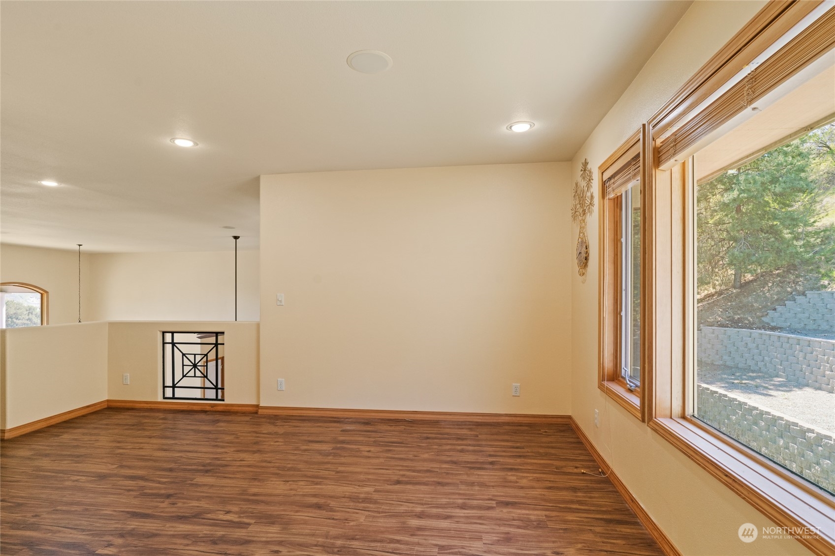 8 Valley View Park Road Omak, WA 98841 - Photo 30 of 40 a view of an empty room with wooden floor and a window