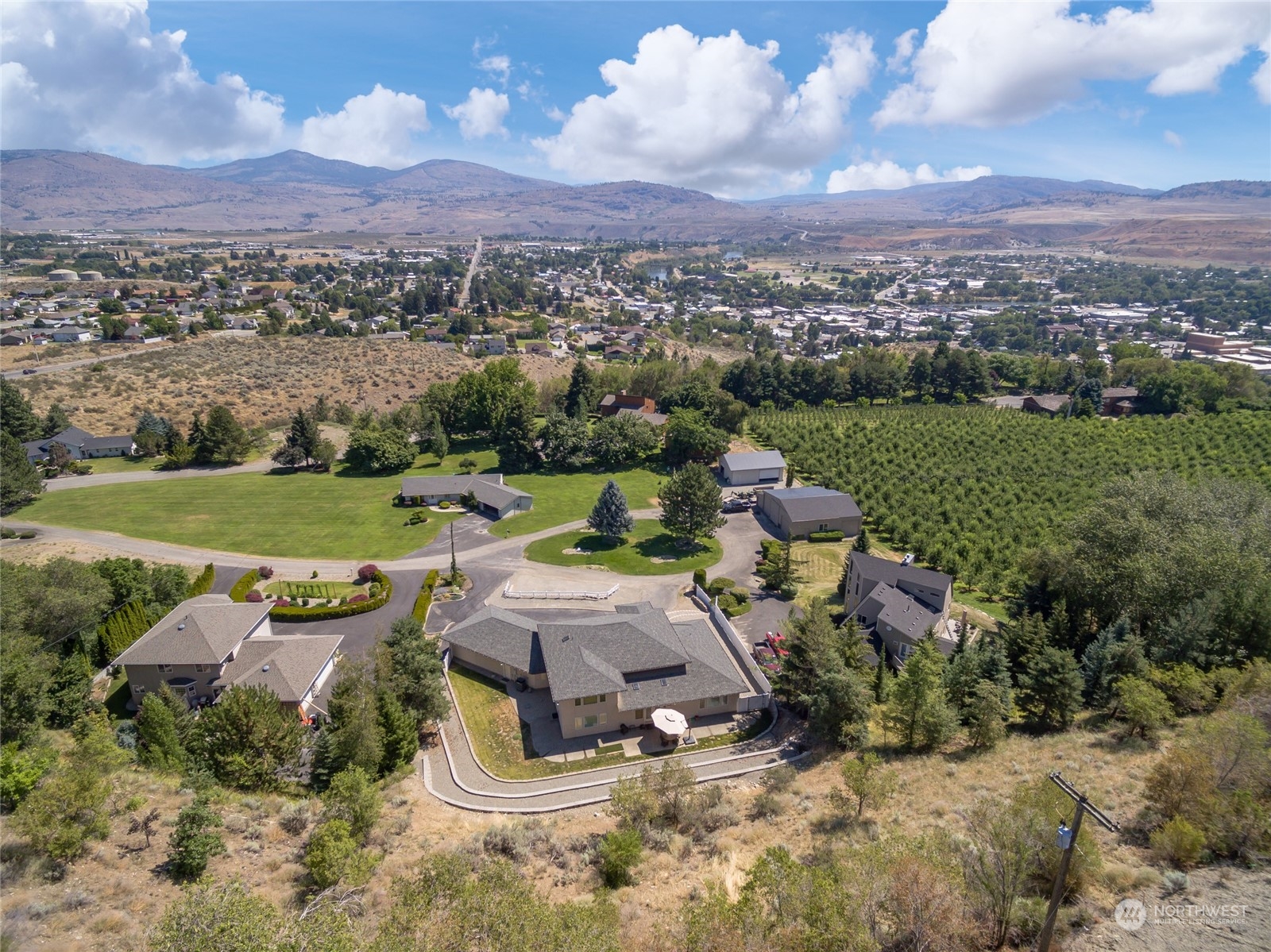 8 Valley View Park Road Omak, WA 98841 - Photo 40 of 40 an aerial view of a house with a yard and lake view