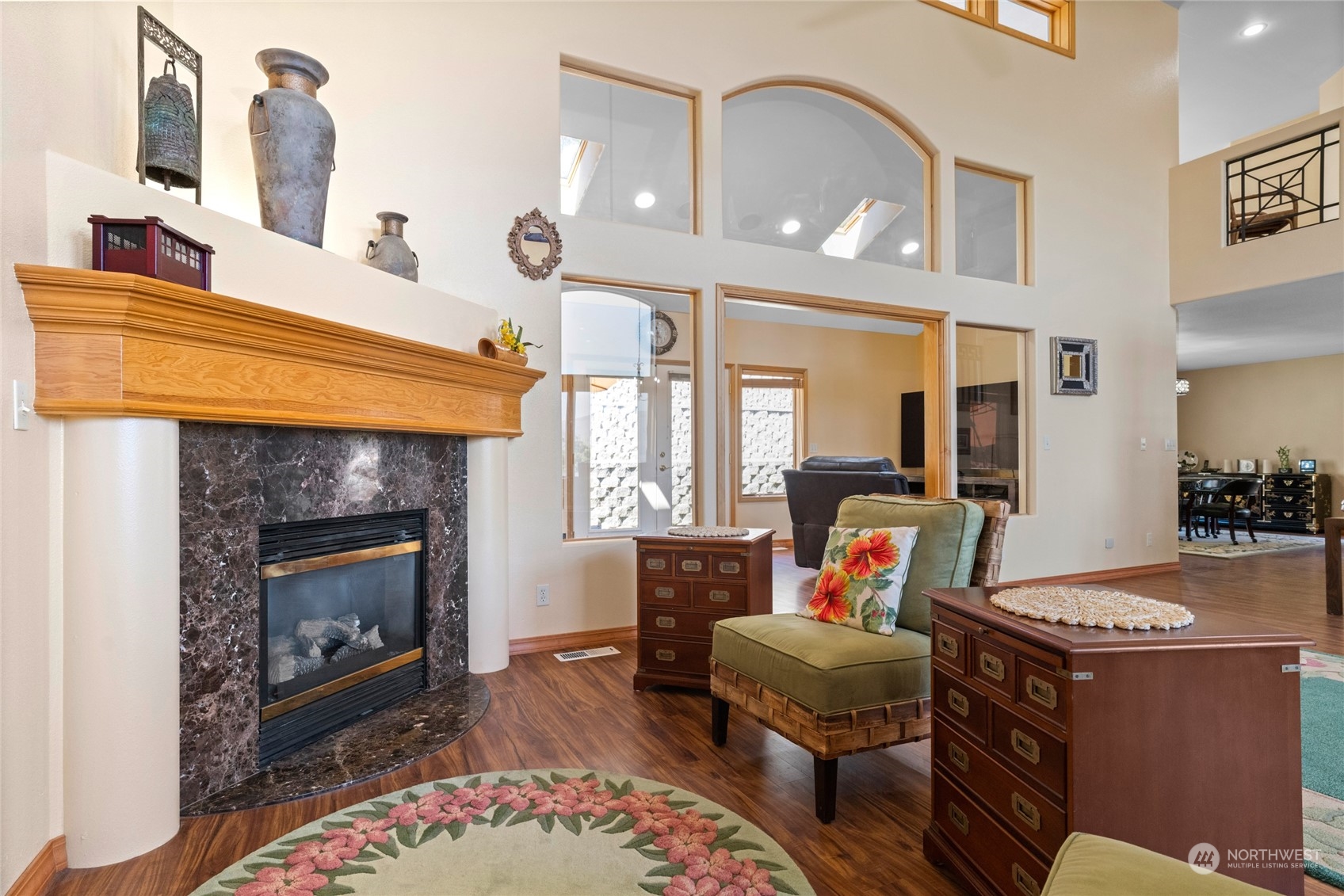 8 Valley View Park Road Omak, WA 98841 - Photo 8 of 40 a living room with furniture a fireplace and a table