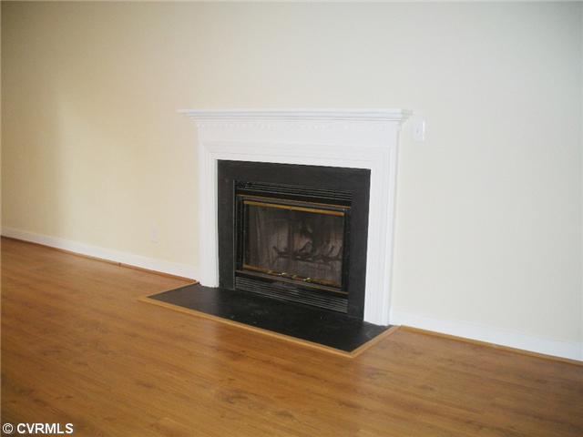 Living Room - View of wood burning fireplace with mantle