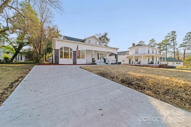 a backyard of area with large trees