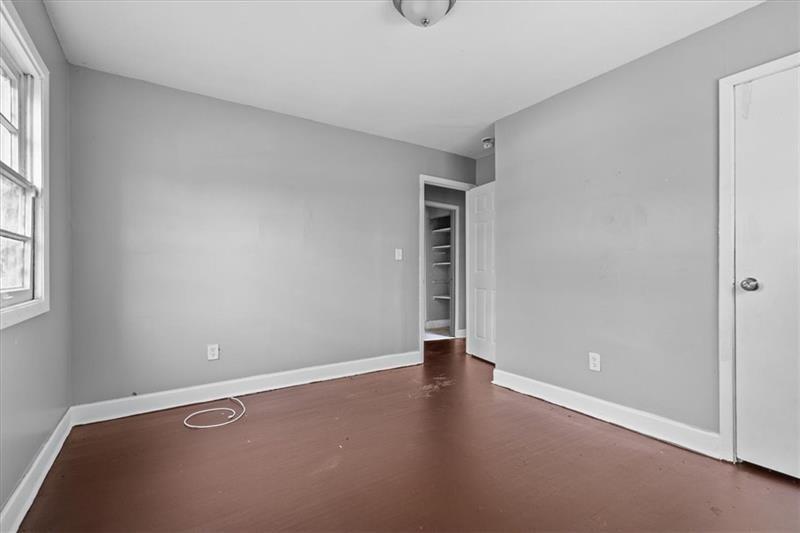685 Bolton Road Northwest Atlanta, GA 30331 - Photo 11 of 21 an empty room with window