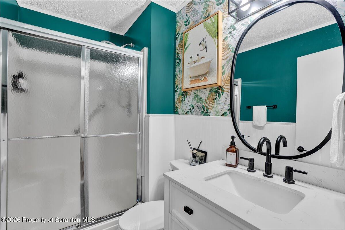 58 Sheffick Road Gouldsboro, PA 18424 - Photo 14 of 44 a bathroom with a sink and a mirror