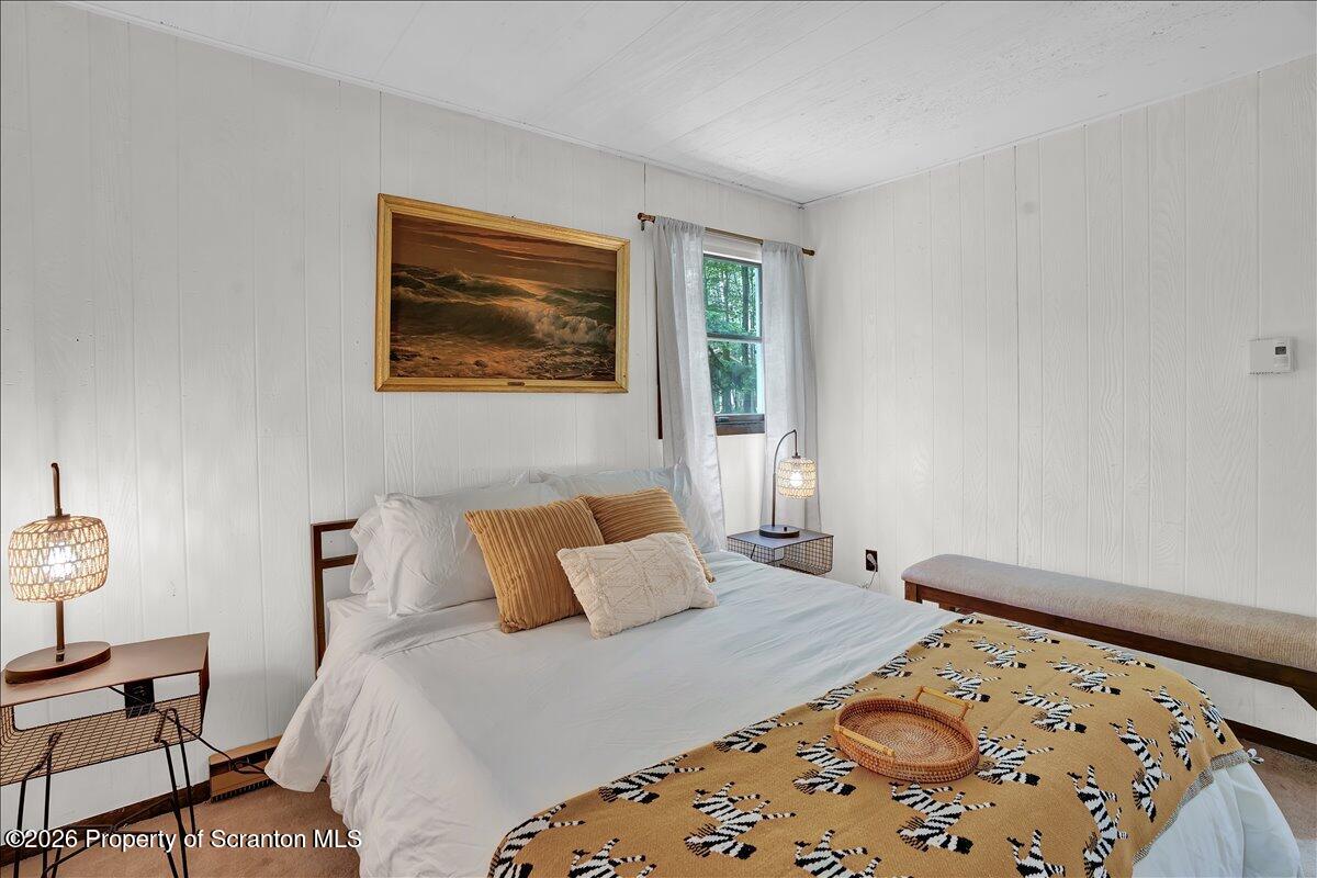 58 Sheffick Road Gouldsboro, PA 18424 - Photo 17 of 44 a bedroom with a bed and a window