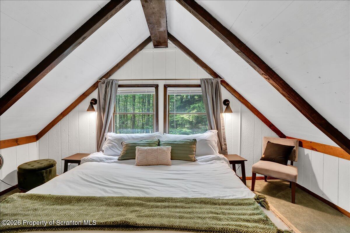 58 Sheffick Road Gouldsboro, PA 18424 - Photo 21 of 44 a bedroom with furniture and a large window