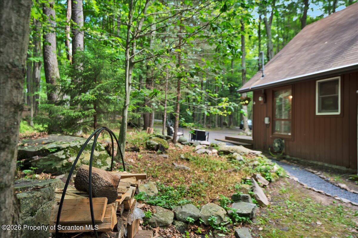 58 Sheffick Road Gouldsboro, PA 18424 - Photo 30 of 44 a view of backyard of house with seating space