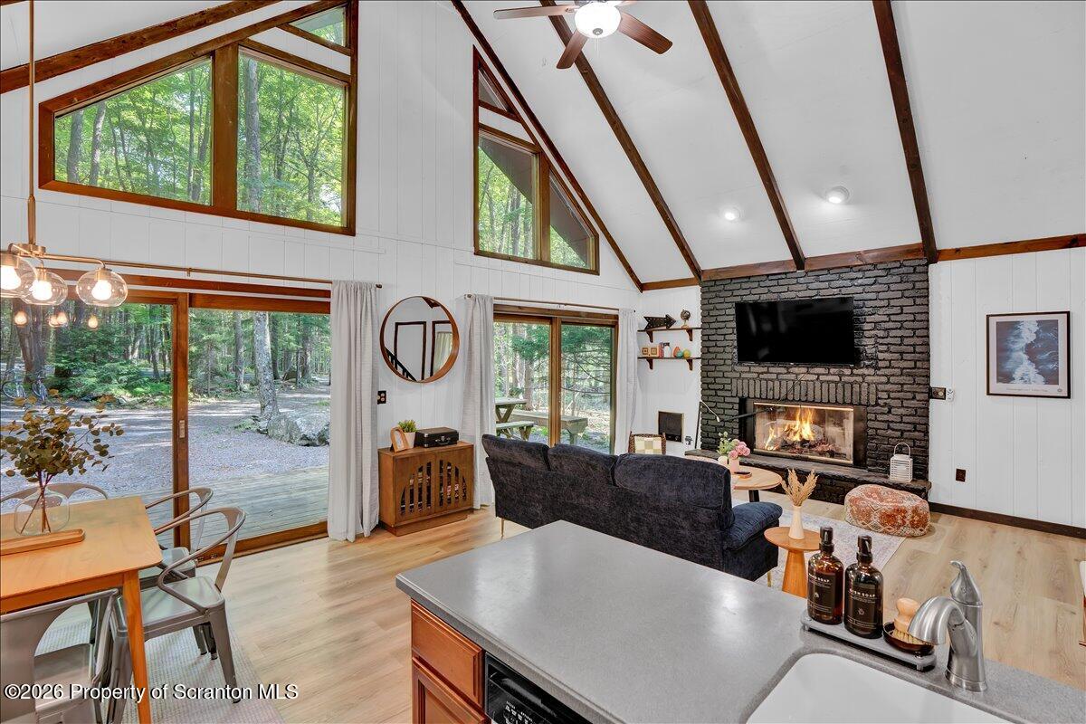 58 Sheffick Road Gouldsboro, PA 18424 - Photo 10 of 44 a living room with fireplace furniture and a flat screen tv