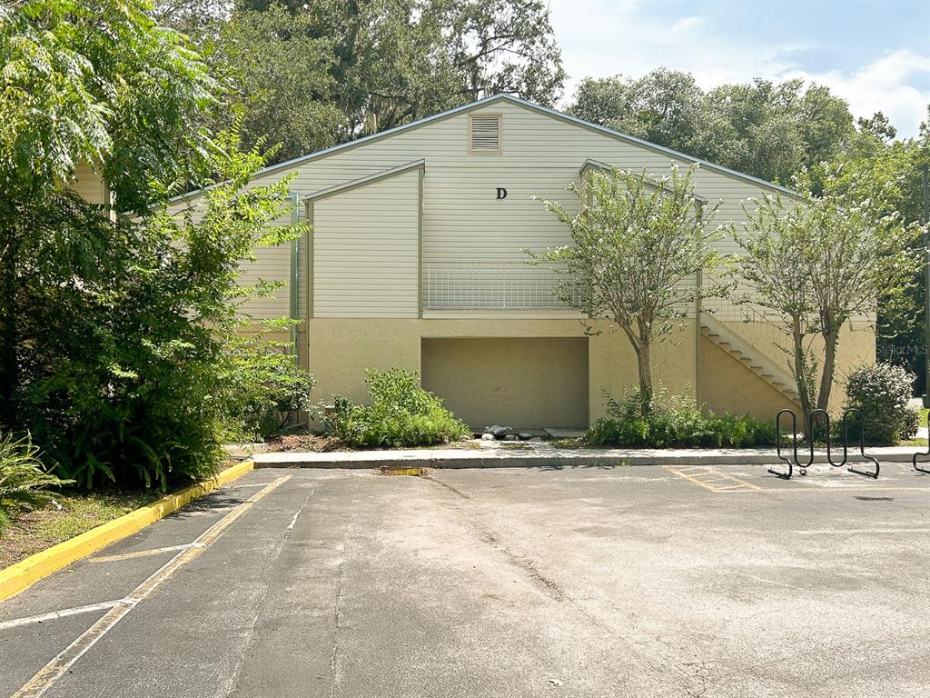 1015 Southwest 9th Street, Unit D2 Gainesville, FL 32601 - Photo 2 of 14 a view of a building with a street