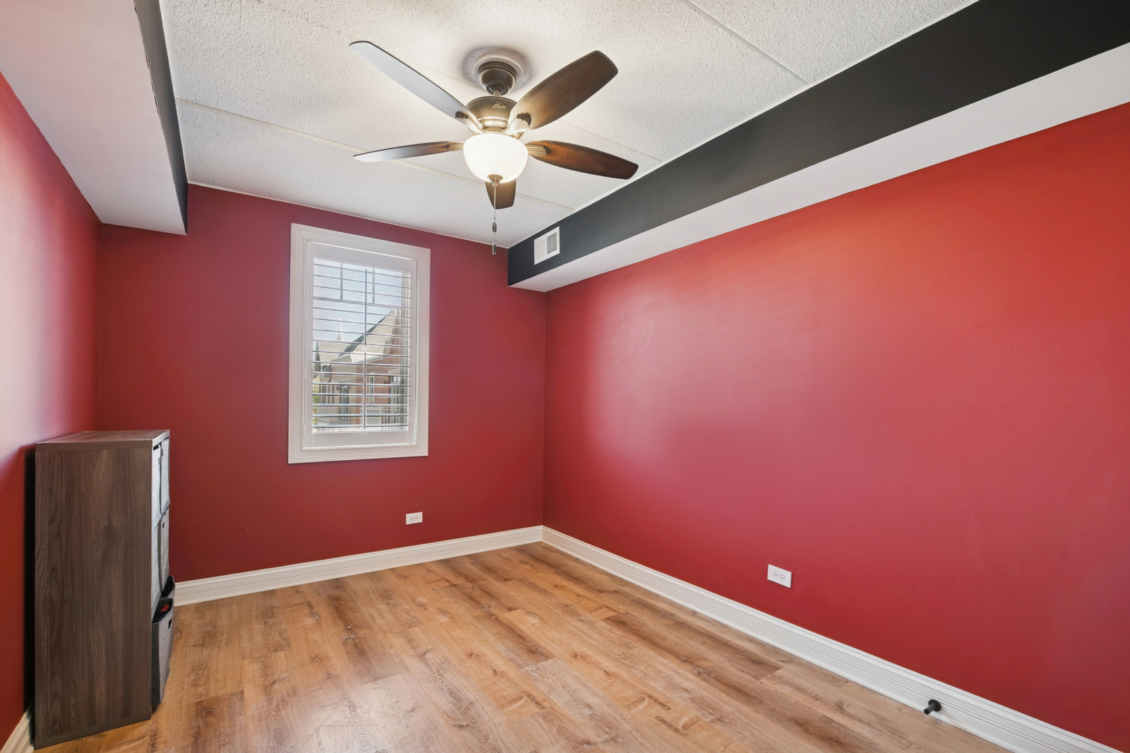 310 South Main Street, Unit 314 Lombard, IL 60148 - Photo 12 of 18 an empty room with a window