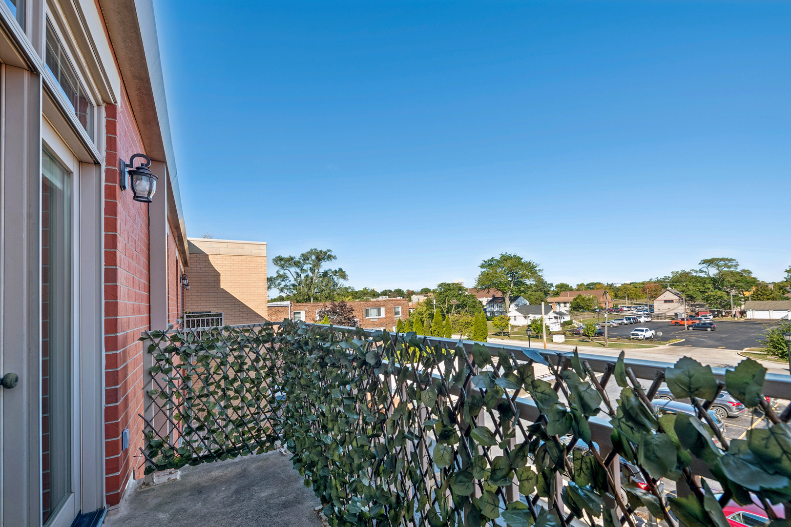 310 South Main Street, Unit 314 Lombard, IL 60148 - Photo 16 of 18 a view of a house with a flower garden