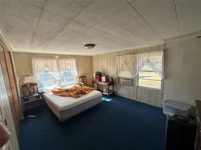 a house with trees in front of it