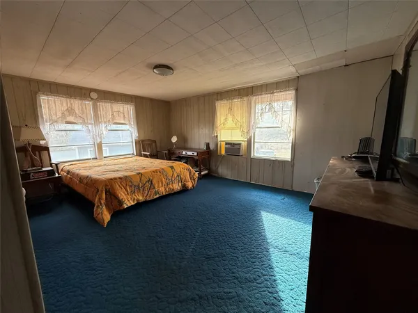 a house with trees in front of it