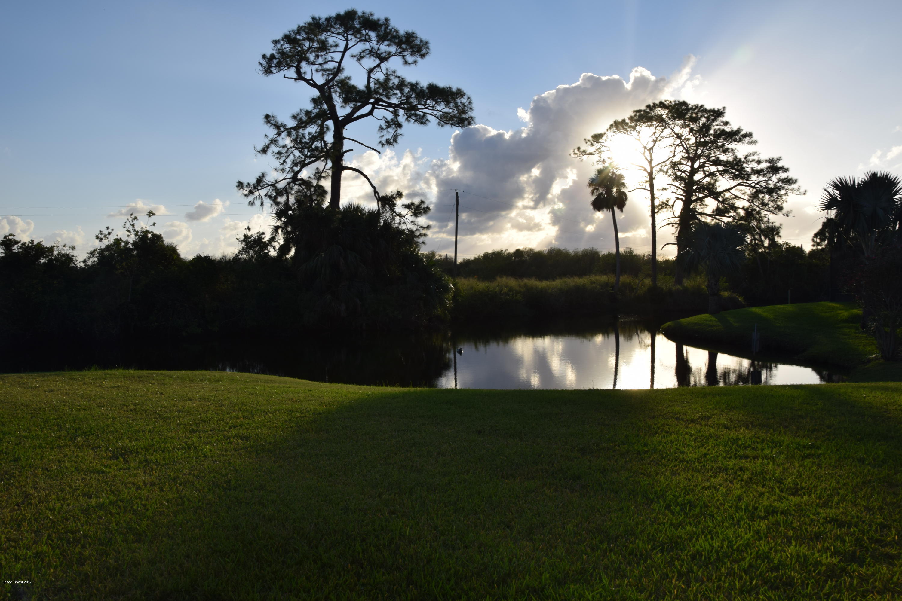 5551 Rising Star Lane Merritt Island, FL 32953 - Photo 4 of 45 Lake/Pond