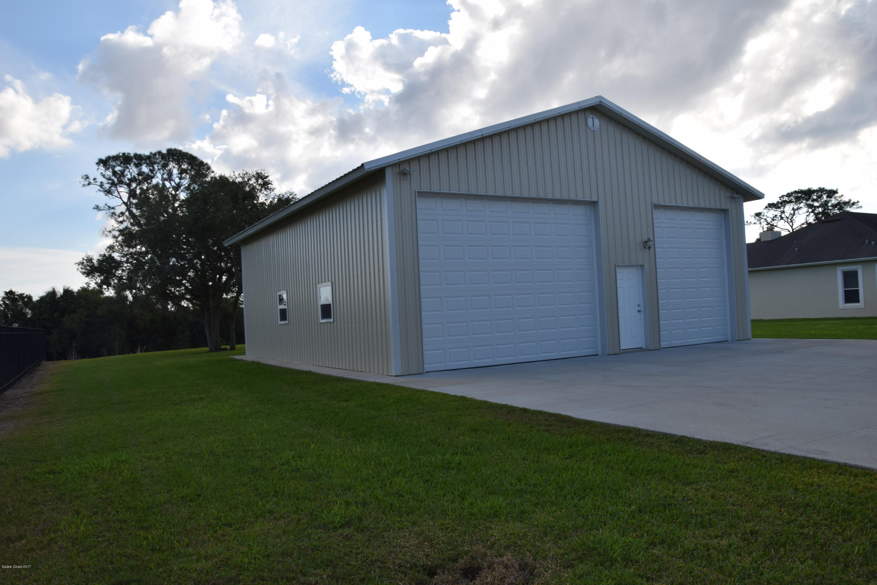 5551 Rising Star Lane Merritt Island, FL 32953 - Photo 6 of 45 HUGE Garage