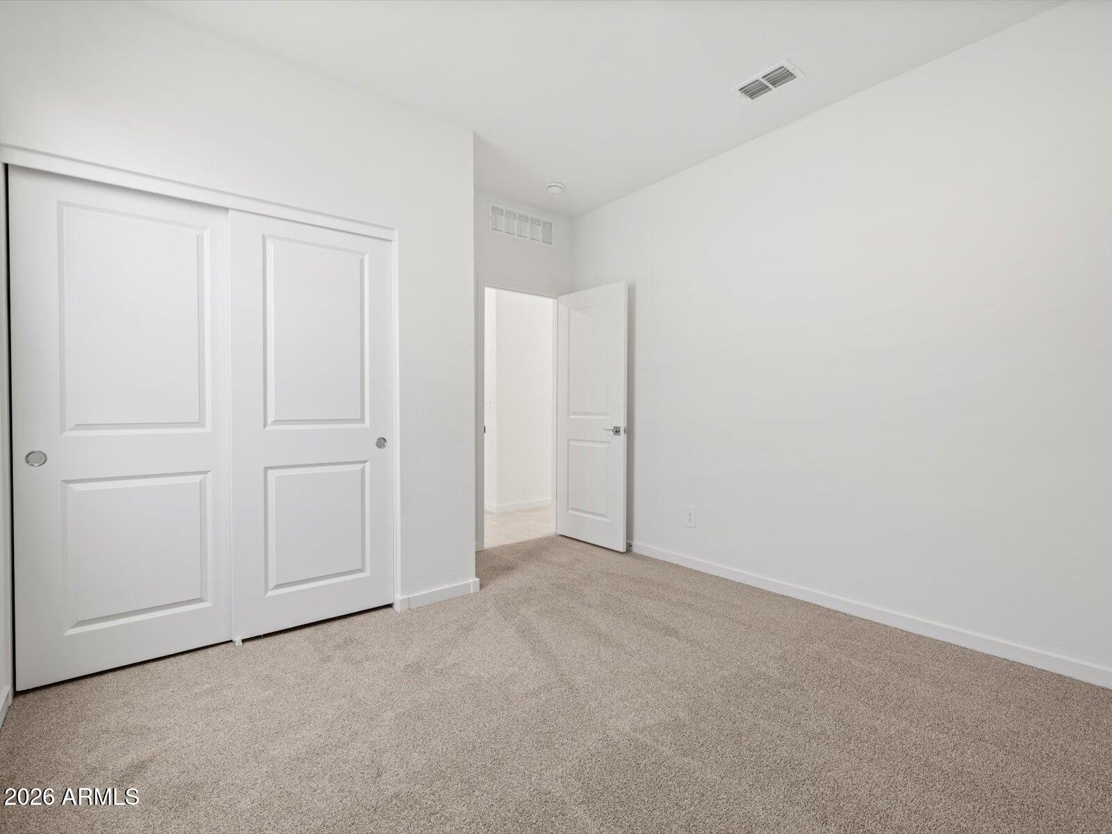 8936 South 244th Lane Buckeye, AZ 85326 - Photo 19 of 45 a view of an empty room
