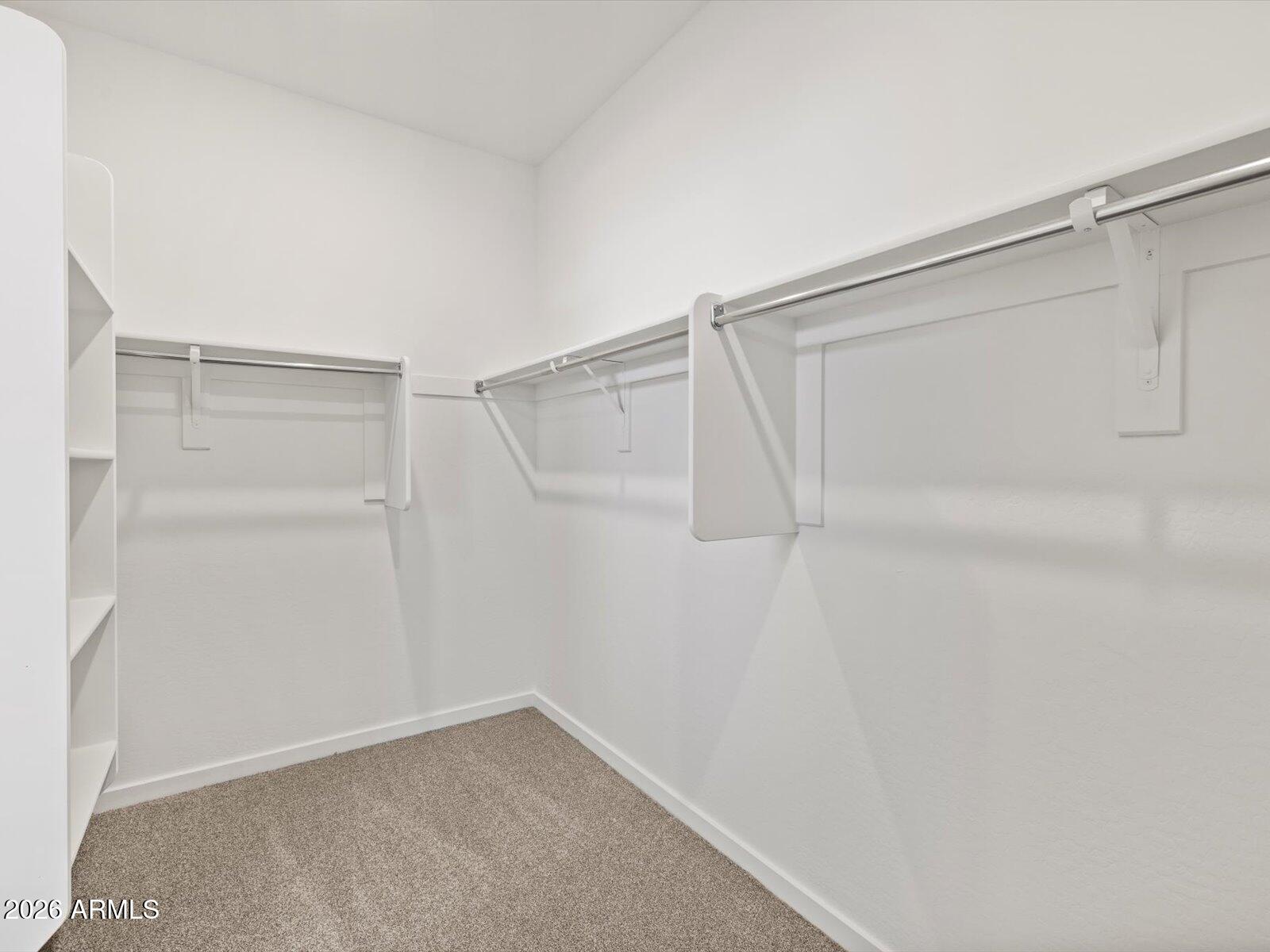8936 South 244th Lane Buckeye, AZ 85326 - Photo 27 of 45 a view of an empty walk in closet