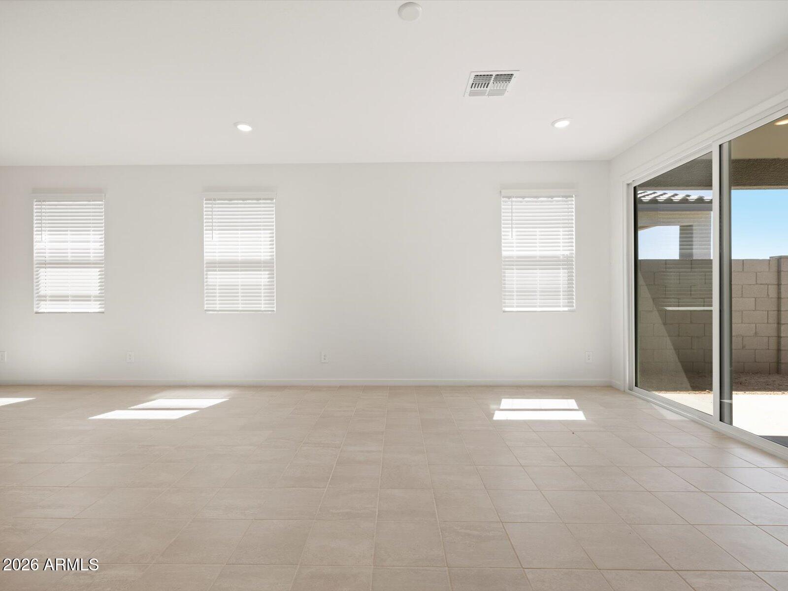 8936 South 244th Lane Buckeye, AZ 85326 - Photo 30 of 45 an empty room with windows