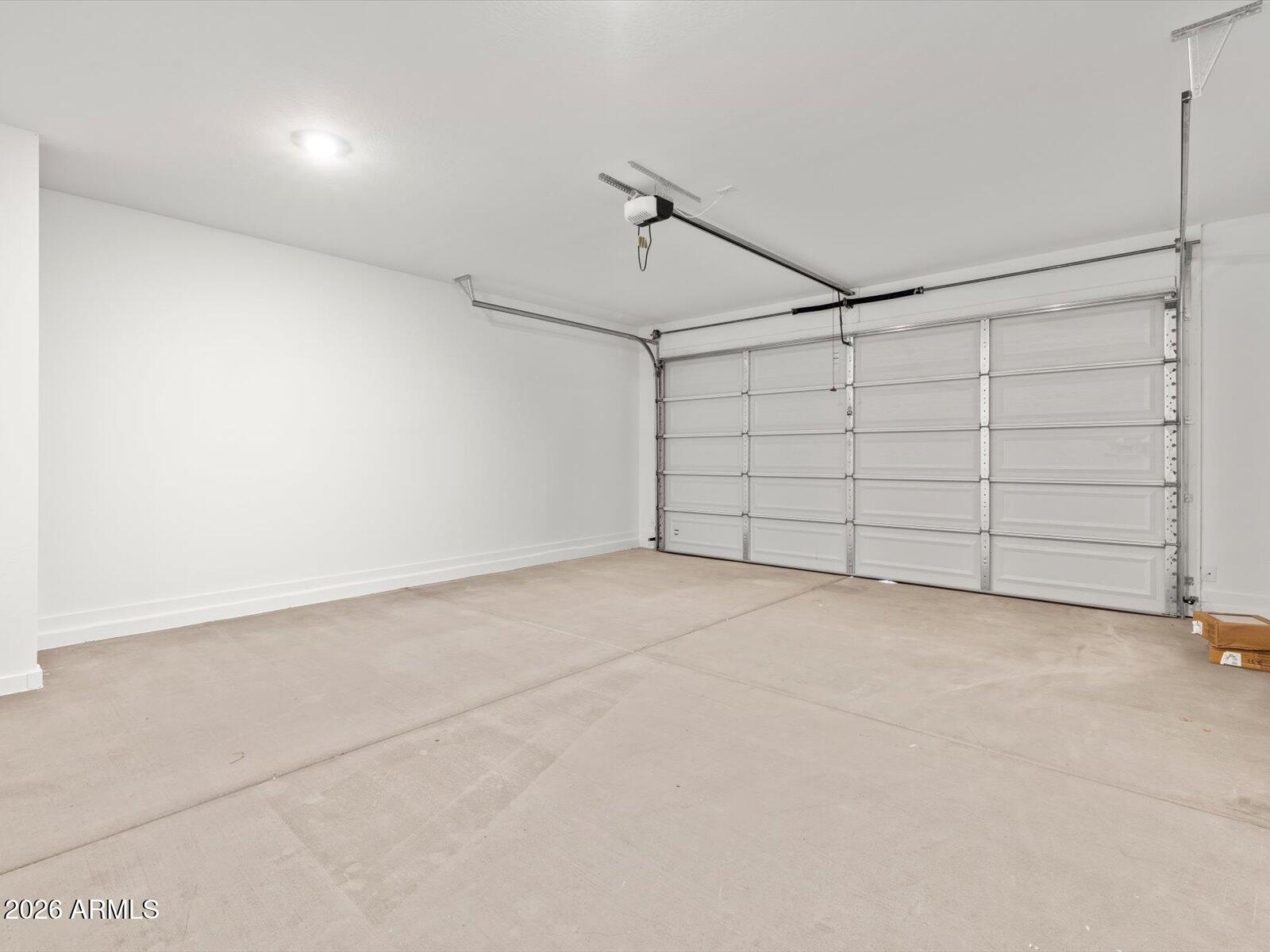 8936 South 244th Lane Buckeye, AZ 85326 - Photo 8 of 45 a view of a garage