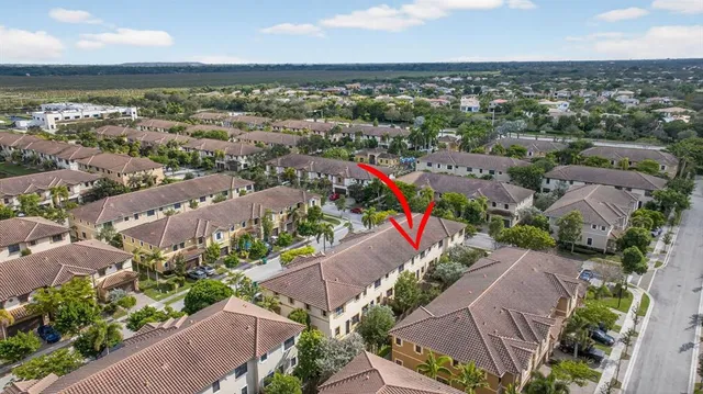 an aerial view of a city with lots of residential buildings