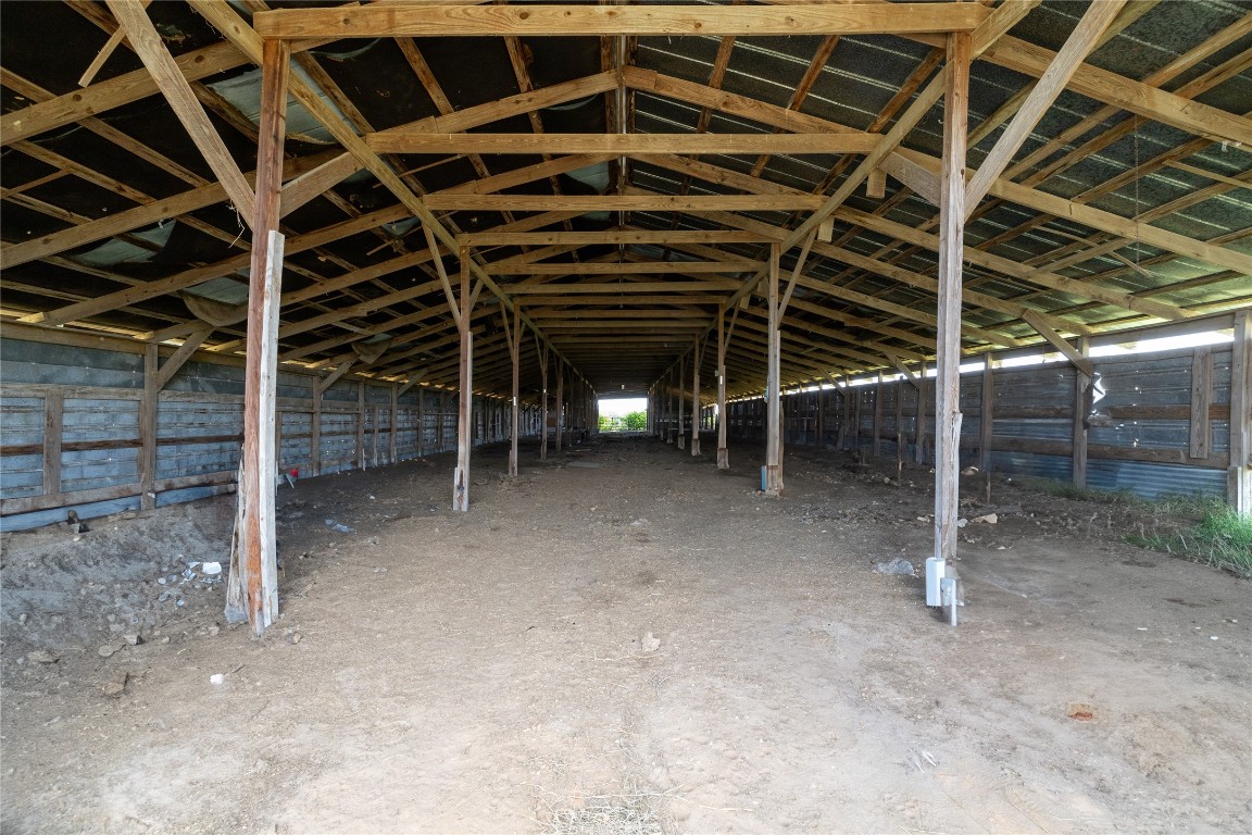 2901 B Mule Creek Road Harwood, TX 78632 - Photo 17 of 25 a view of an empty room with wooden walls