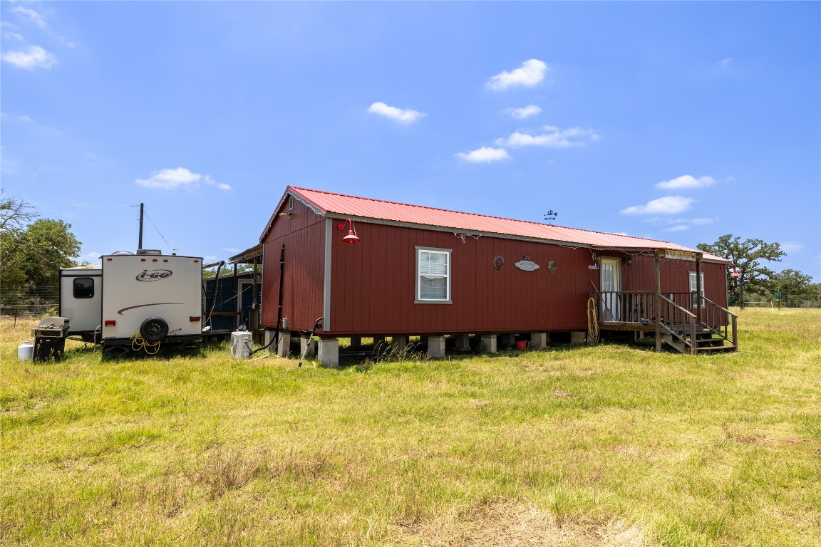 2901 B Mule Creek Road Harwood, TX 78632 - Photo 8 of 25 a view of a house with a yard