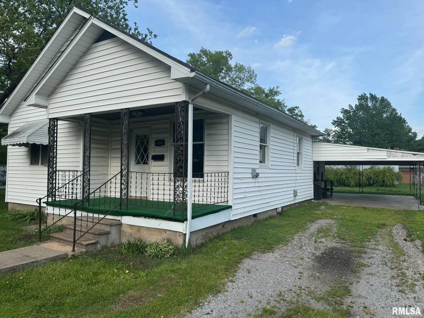 604 South 23rd Street Herrin, IL 62948 - Photo 2 of 14 a view of a house with a yard