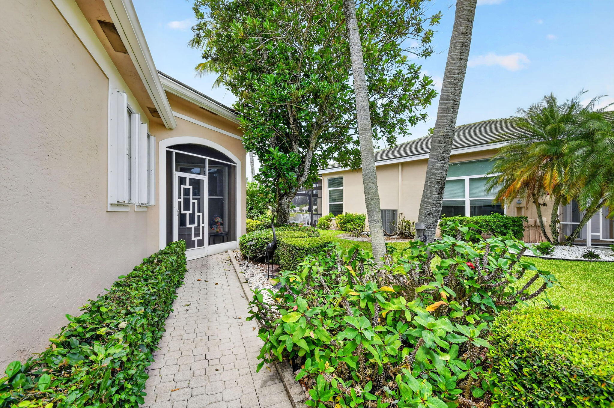 7717 Rockford Road Boynton Beach, FL 33472 - Photo 2 of 76 walkway to entrance