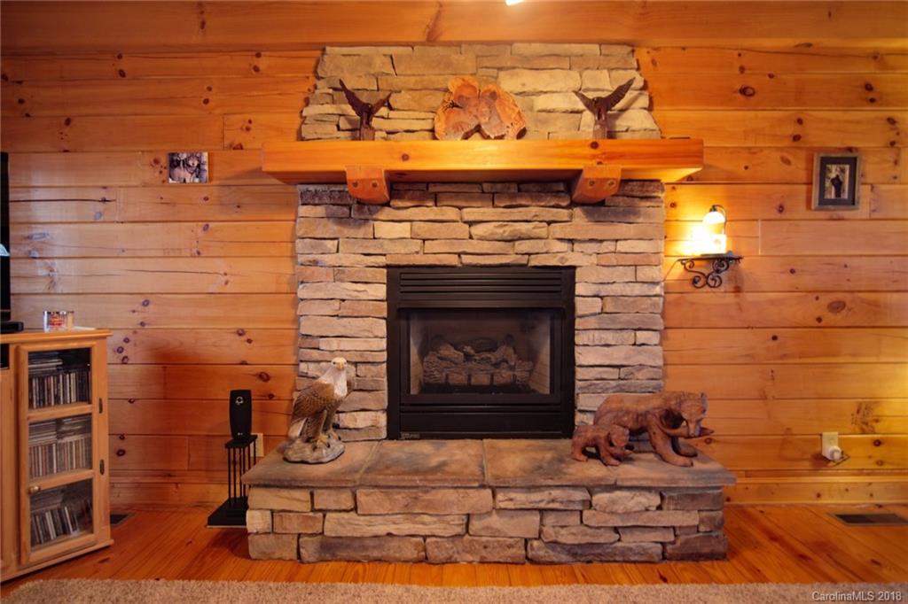 321 River Ridge Parkway, Unit 29 Rutherfordton, NC 28139 - Photo 14 of 33 a view of a fireplace with wooden floor