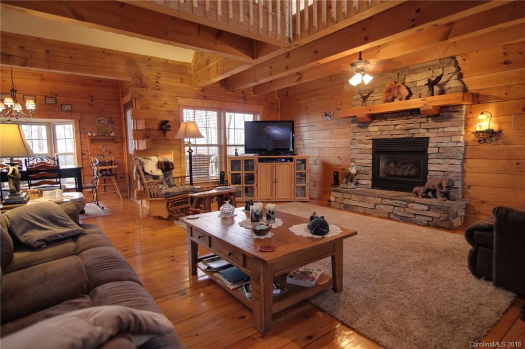321 River Ridge Parkway, Unit 29 Rutherfordton, NC 28139 - Photo 10 of 33 a living room with furniture and a fireplace