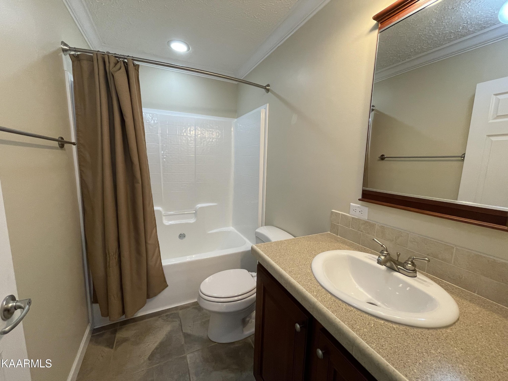 114 George Young Road Jamestown, TN 38556 - Photo 10 of 25 a bathroom with a granite countertop sink toilet and shower