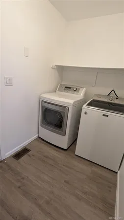 a utility room with washer and dryer