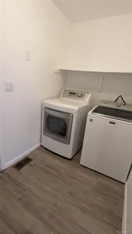 a utility room with washer and dryer