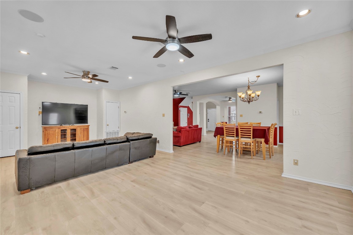 11713 Rydalwater Lane Austin, TX 78754 - Photo 10 of 29 a living room with furniture and a flat screen tv