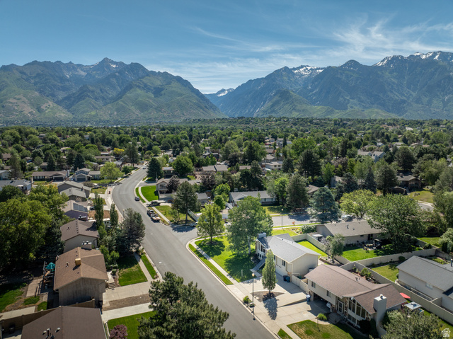 2088 Falcon Way Sandy, UT 84093 - Photo 39 of 46 Residential neighborhood featuring mature trees and mountain scenery