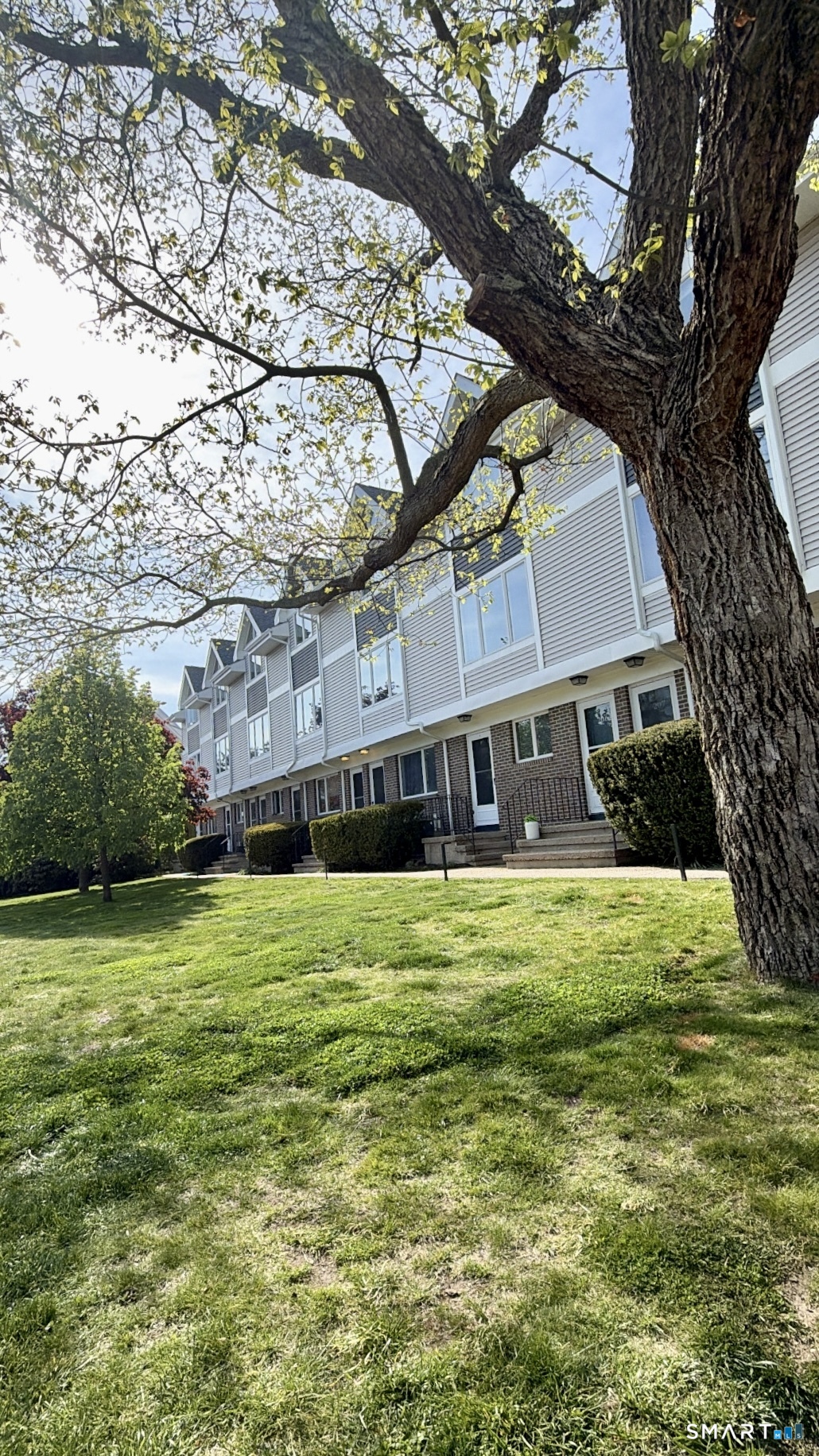 a house view with a garden space