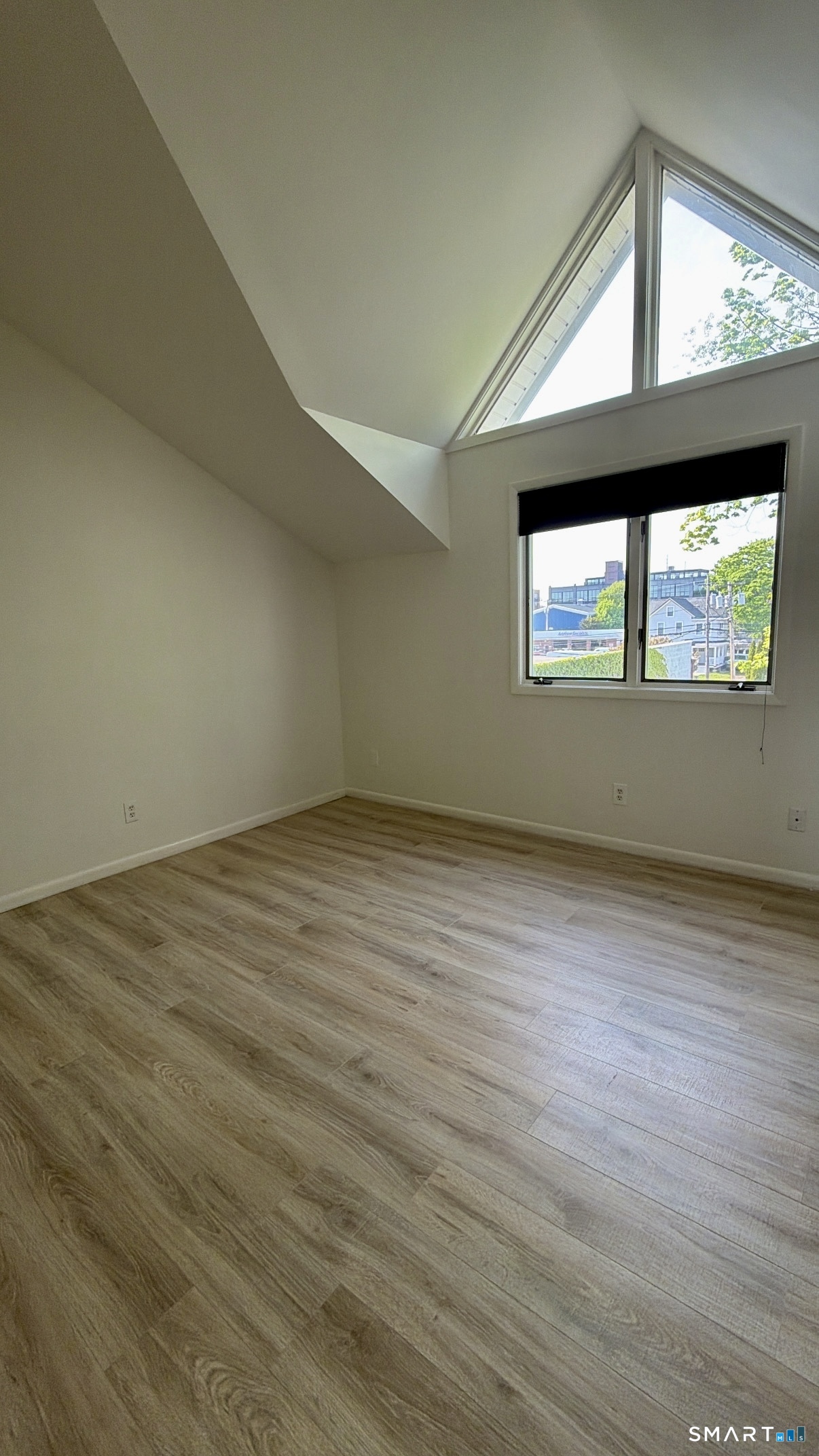 25 Cottage Street, Unit 202 Norwalk, CT 06855 - Photo 13 of 24 an empty room with a window