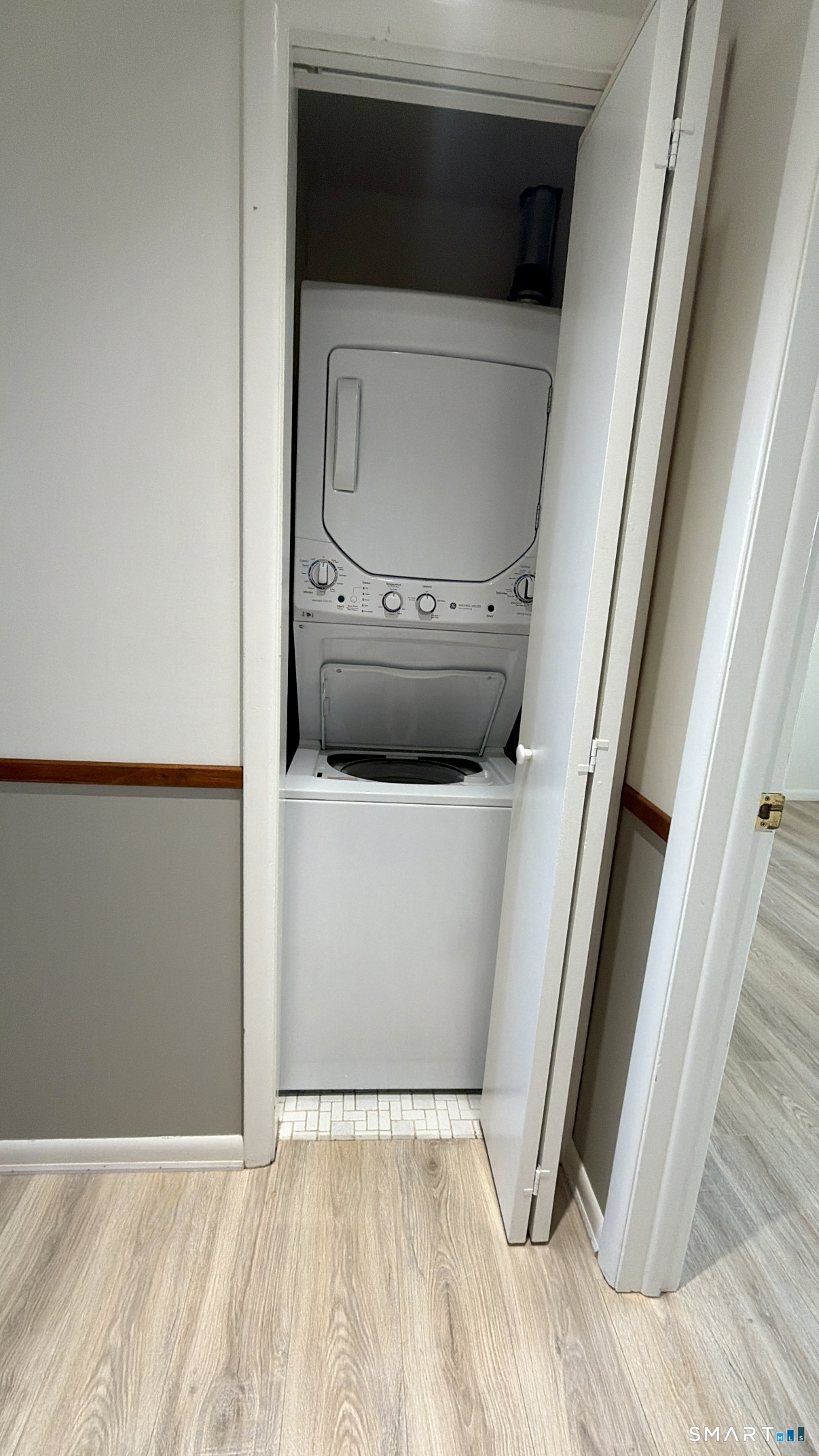 25 Cottage Street, Unit 202 Norwalk, CT 06855 - Photo 16 of 24 a utility room with a washer and dryer