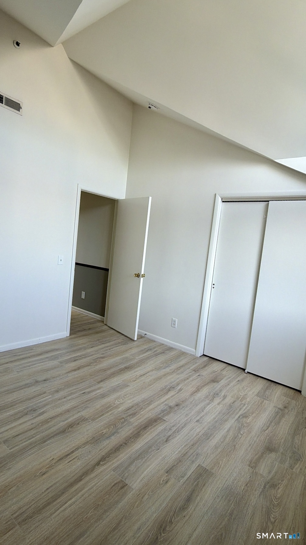 25 Cottage Street, Unit 202 Norwalk, CT 06855 - Photo 19 of 24 a view of empty room with wooden floor
