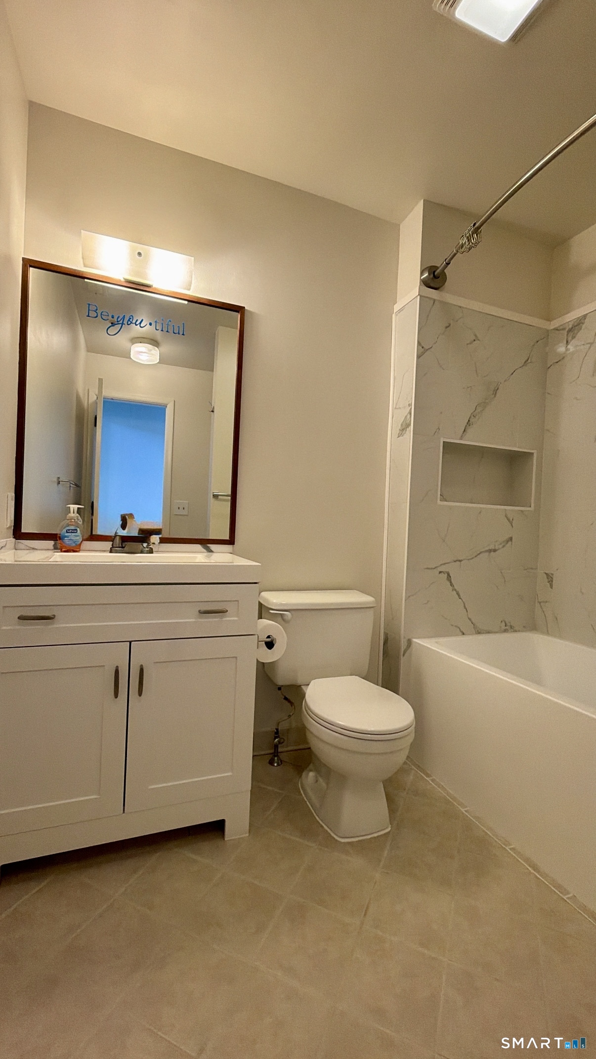 25 Cottage Street, Unit 202 Norwalk, CT 06855 - Photo 22 of 24 a bathroom with a toilet a sink and bathtub