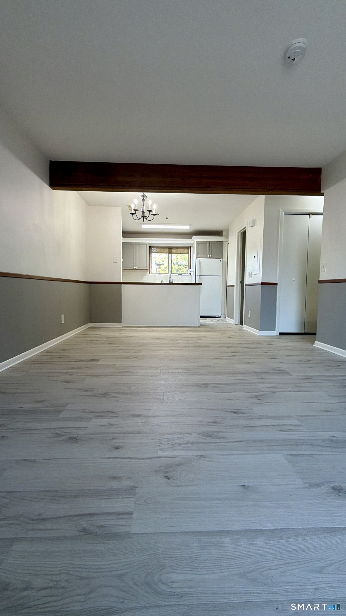 25 Cottage Street, Unit 202 Norwalk, CT 06855 - Photo 9 of 24 a view of an empty room with a window