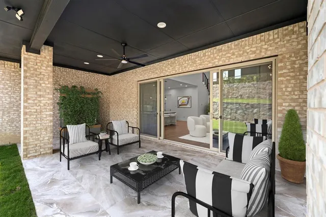 a outdoor living space with furniture and garden view