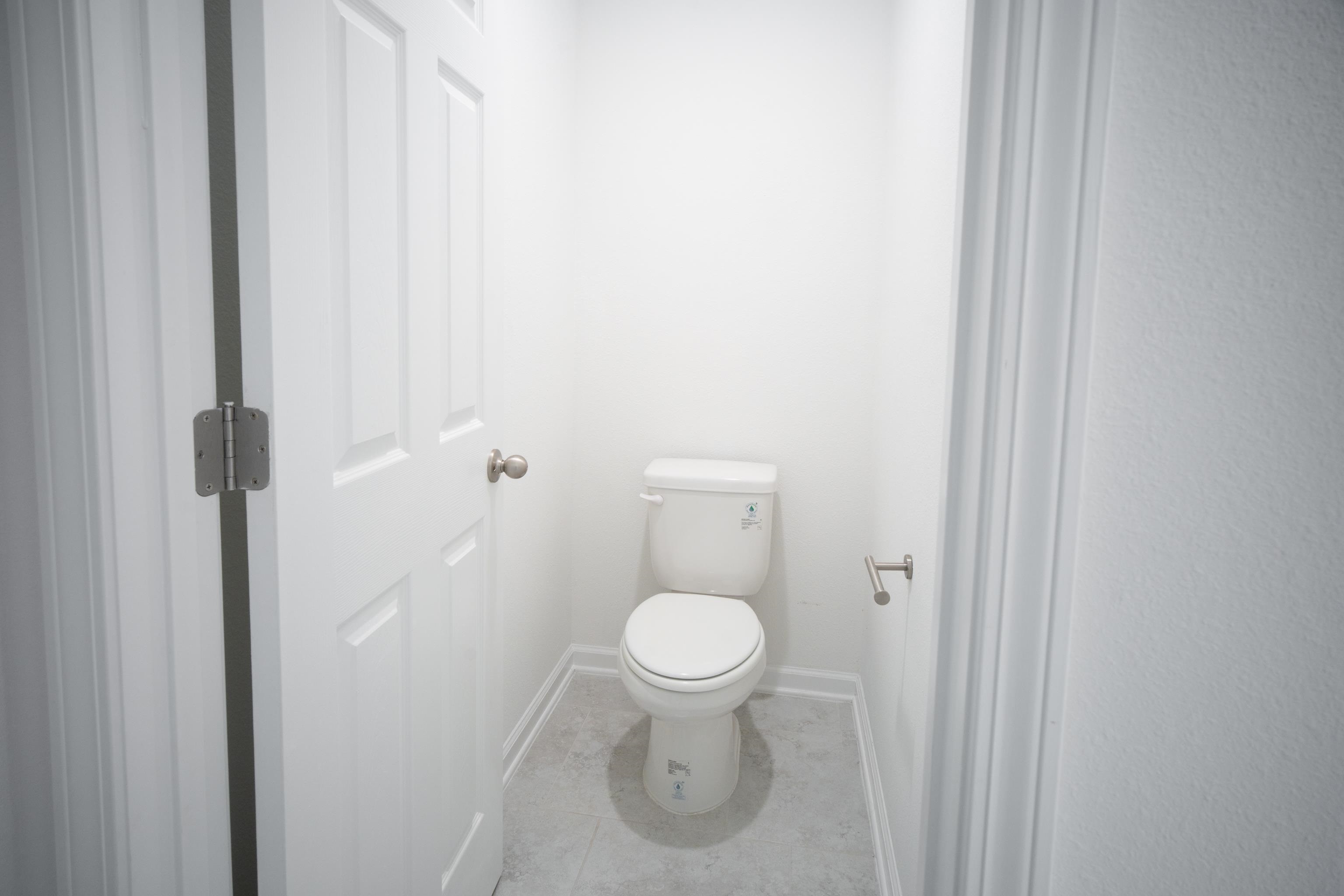 26 Ridge Lake Road St. Augustine, FL 32086 - Photo 14 of 27 a bathroom with a toilet and a sink